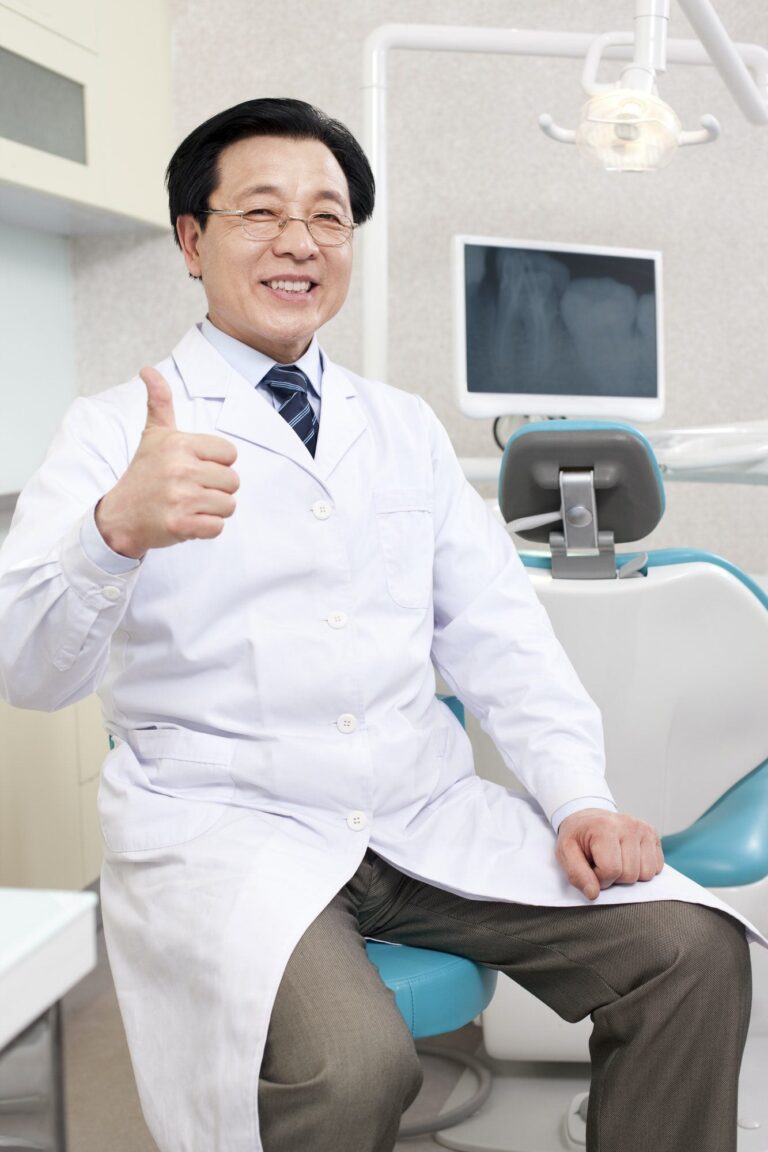 Dentist in dental clinic